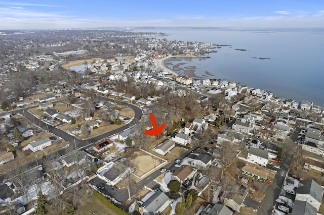 birds eye view of property featuring a residential view and a water view