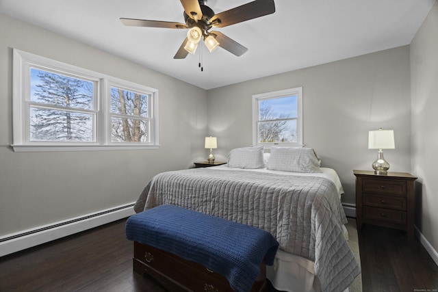 bedroom featuring a ceiling fan, dark wood-style flooring, and baseboard heating