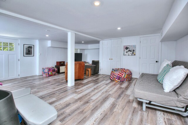 living room with recessed lighting and light wood finished floors