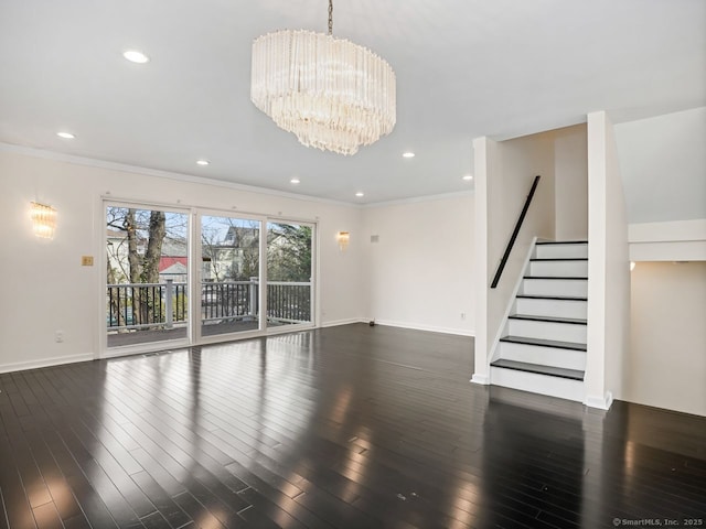 unfurnished living room with dark wood-style flooring, crown molding, stairway, a chandelier, and baseboards