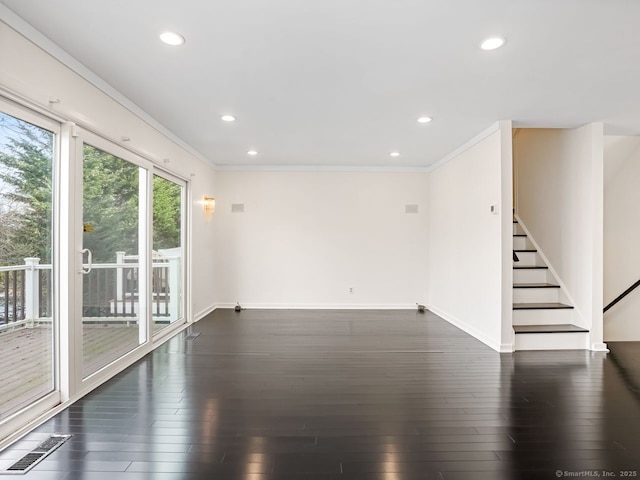 unfurnished room featuring dark wood-type flooring, recessed lighting, visible vents, and baseboards