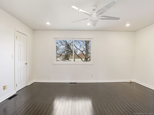 unfurnished room featuring a ceiling fan, baseboards, dark wood-type flooring, and recessed lighting