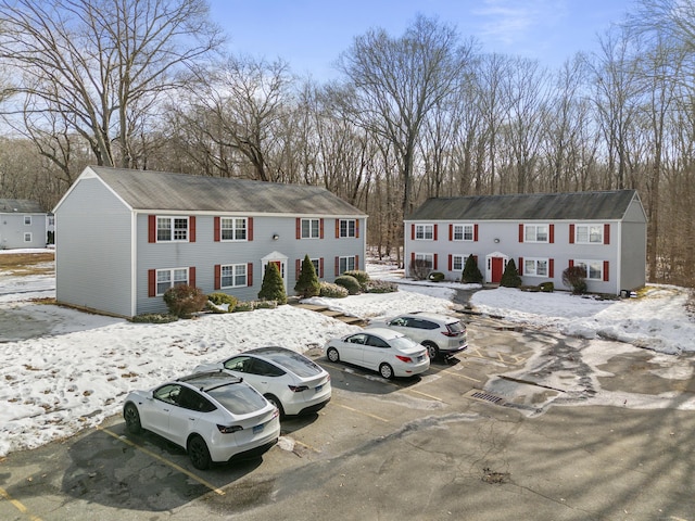 view of front of home with uncovered parking