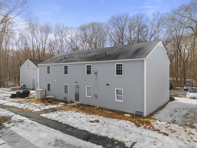 view of snow covered house