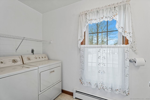 laundry room with laundry area, independent washer and dryer, baseboards, and a baseboard radiator