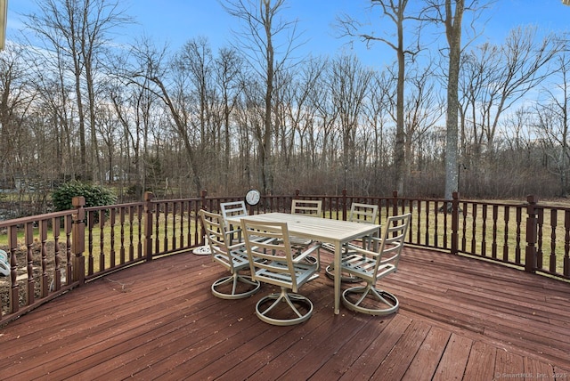 deck featuring outdoor dining space