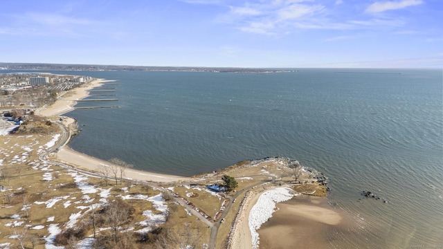 bird's eye view featuring a beach view and a water view