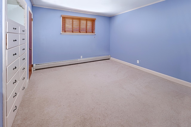 empty room featuring baseboards, ornamental molding, baseboard heating, and light colored carpet