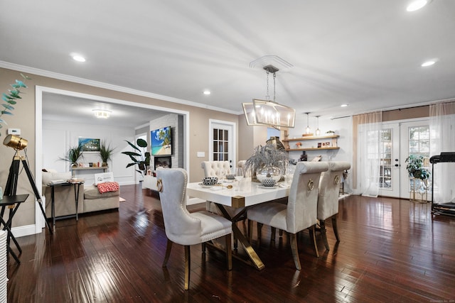 dining room featuring recessed lighting, ornamental molding, dark wood-type flooring, and french doors