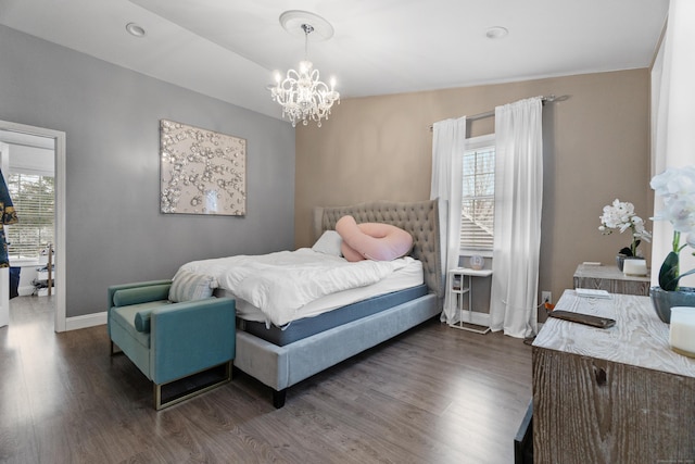 bedroom with an inviting chandelier, baseboards, dark wood-style flooring, and recessed lighting