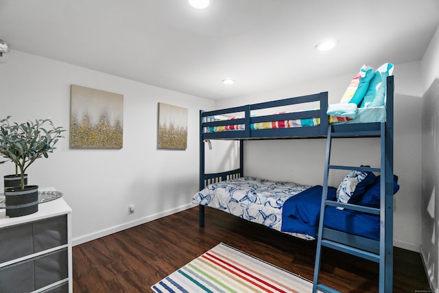 bedroom featuring recessed lighting, dark wood-style flooring, and baseboards