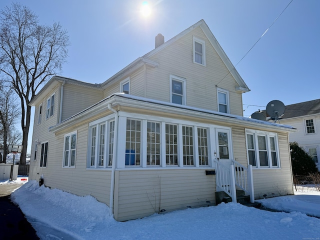 view of front of house with a chimney