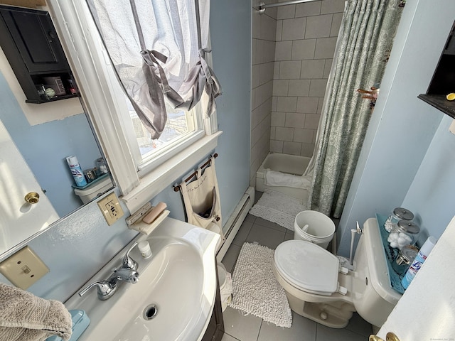 full bath with toilet, a baseboard heating unit, tiled shower, and tile patterned floors