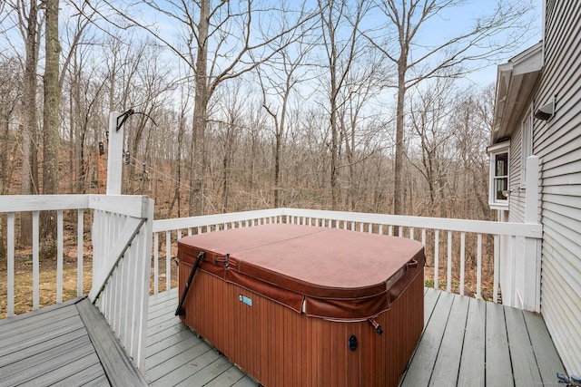 deck featuring a hot tub