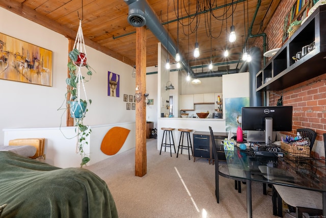 interior space with wooden ceiling and a towering ceiling