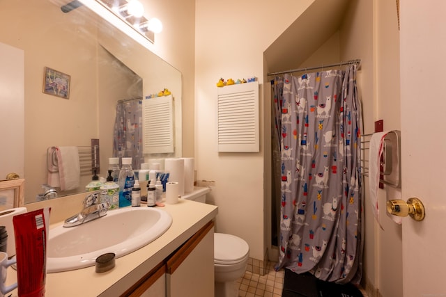 bathroom with vanity, curtained shower, toilet, and tile patterned flooring