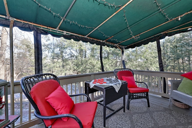 sunroom featuring a healthy amount of sunlight