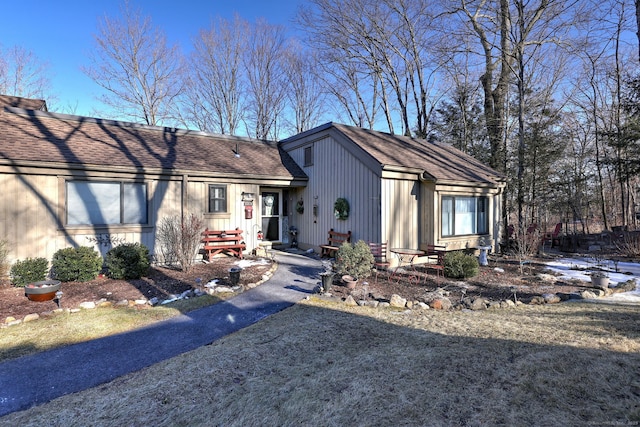 view of front of house with a shingled roof