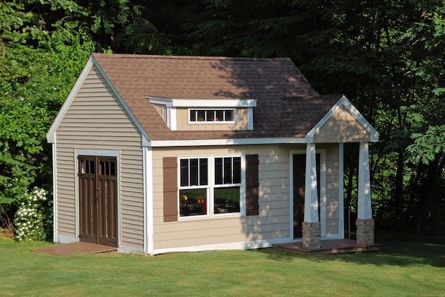 view of outbuilding featuring an outdoor structure