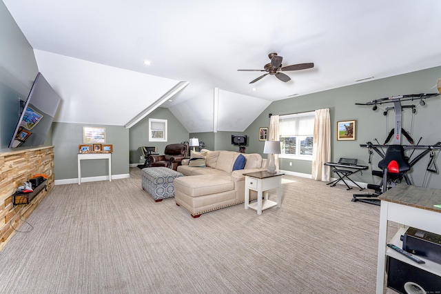 carpeted living area featuring lofted ceiling, visible vents, a ceiling fan, and baseboards