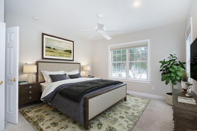 bedroom featuring carpet floors, ceiling fan, and baseboards