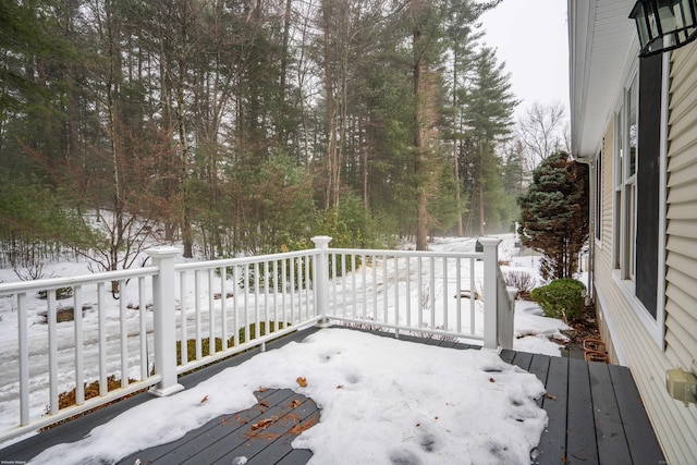 view of snow covered deck