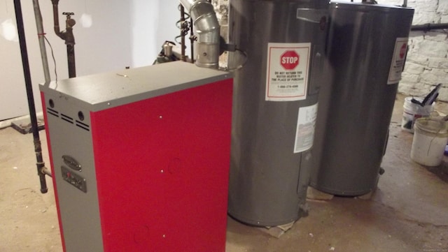 utility room featuring water heater