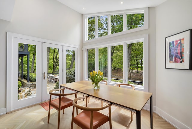 sunroom with a wealth of natural light and french doors