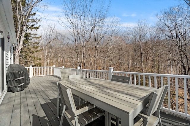 deck featuring a grill