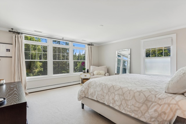 bedroom with carpet floors, visible vents, a baseboard heating unit, and crown molding