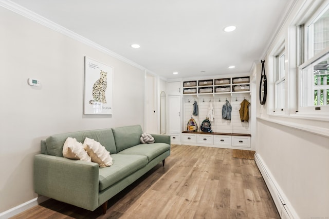 mudroom featuring recessed lighting, a baseboard heating unit, light wood-style floors, ornamental molding, and baseboards