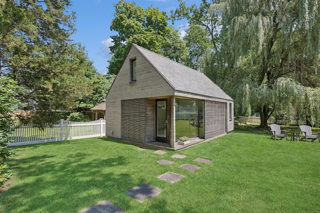 view of outdoor structure with fence