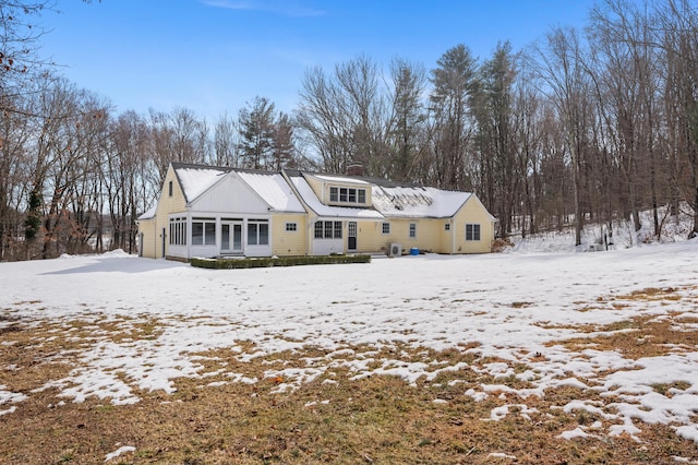 view of front of property with a chimney