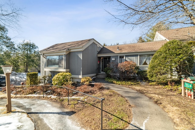 view of front of house featuring a shingled roof