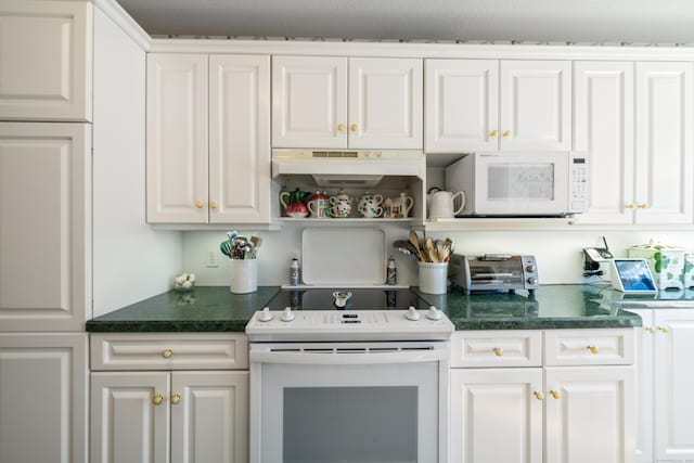 kitchen with under cabinet range hood, open shelves, dark countertops, white appliances, and white cabinetry