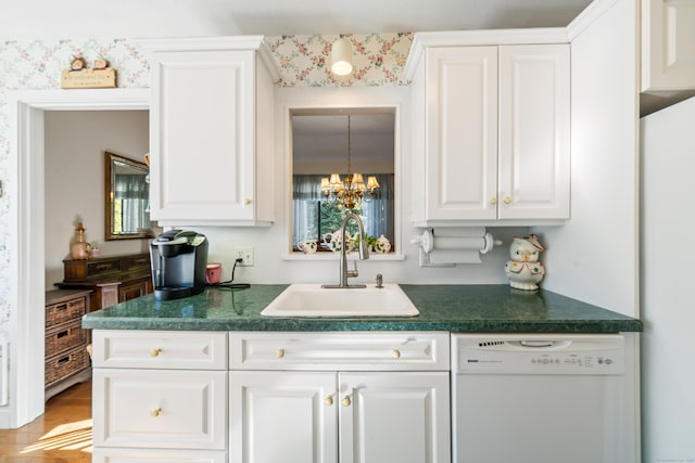bar with an inviting chandelier, dishwasher, wood finished floors, and a sink