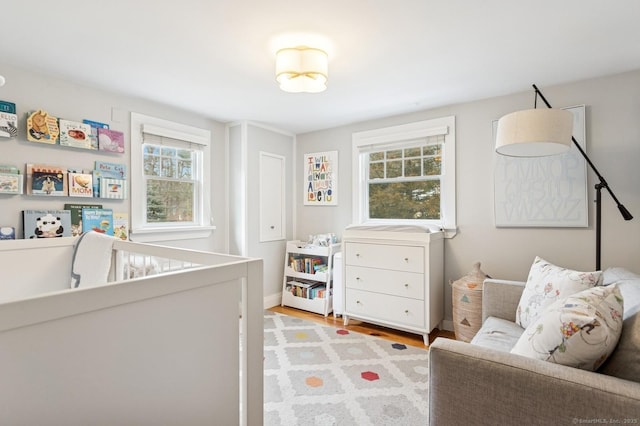 bedroom featuring light wood-style floors