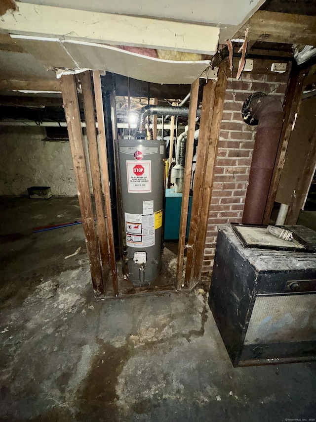 utility room with gas water heater