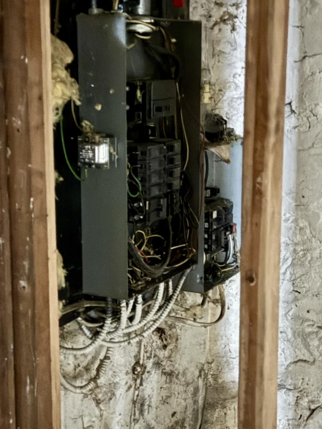 utility room featuring electric panel