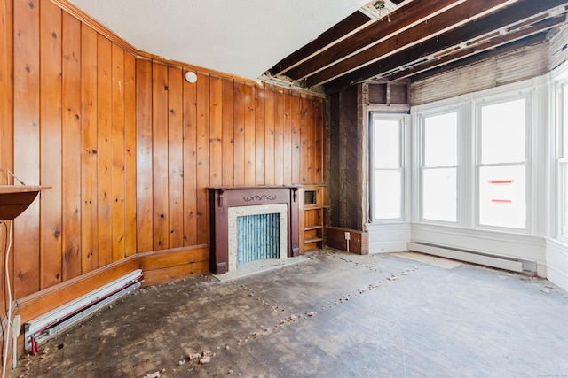 unfurnished living room with baseboard heating