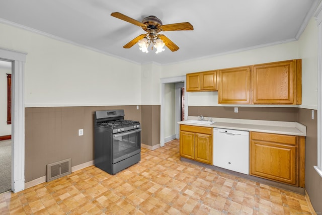 kitchen with a sink, visible vents, light countertops, stainless steel gas range, and dishwasher