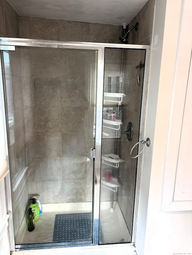 full bathroom with a stall shower