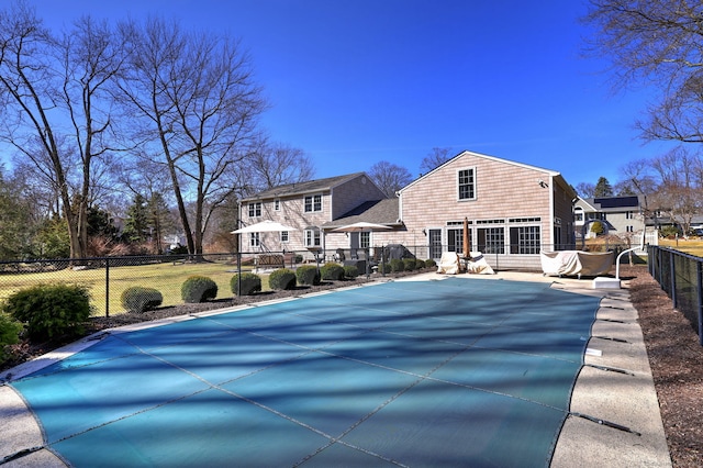 view of pool featuring a fenced backyard