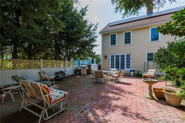 view of patio / terrace featuring outdoor dining space and fence