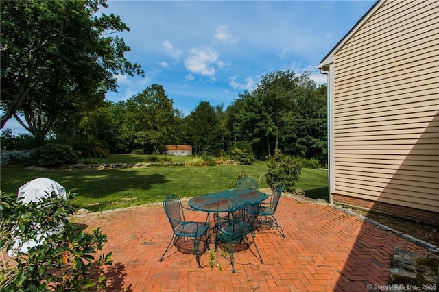 view of patio featuring outdoor dining space