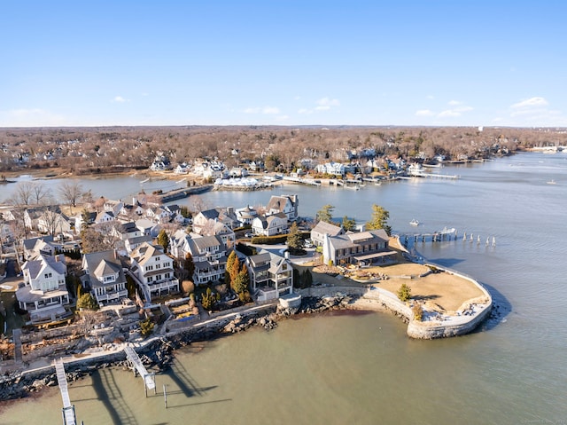 bird's eye view featuring a water view and a residential view