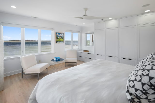 bedroom with recessed lighting, visible vents, ceiling fan, light wood-type flooring, and baseboards