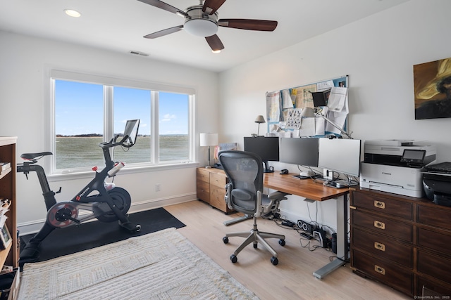 home office featuring recessed lighting, visible vents, ceiling fan, light wood-type flooring, and baseboards