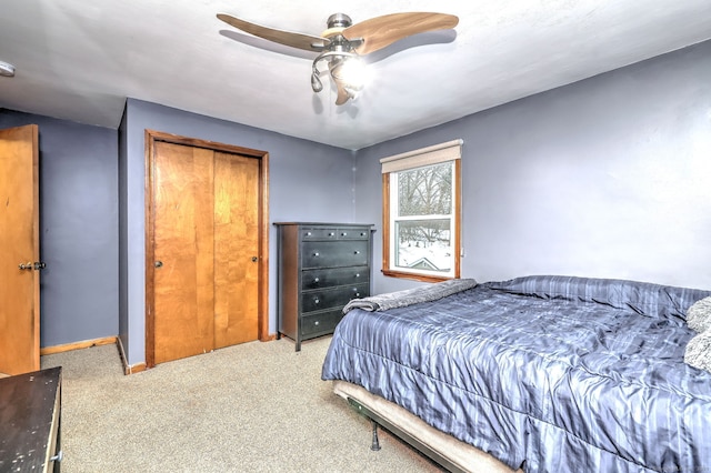 bedroom featuring carpet flooring, ceiling fan, and baseboards