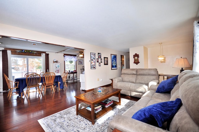 living room with dark wood-type flooring